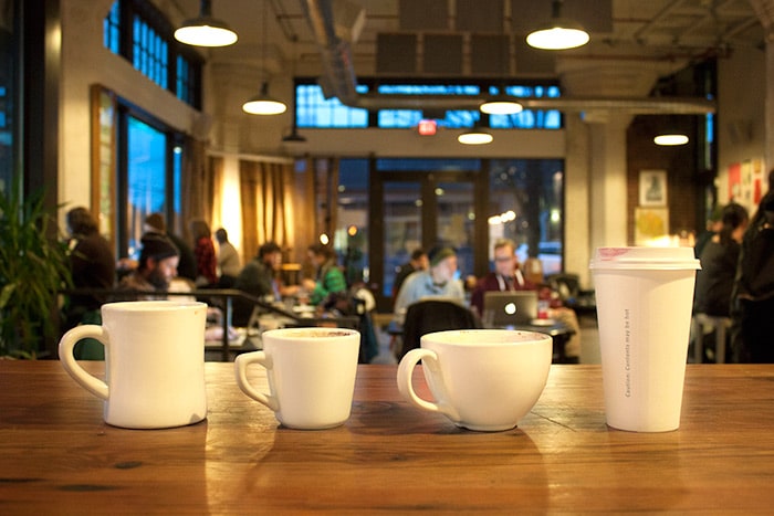 A series of coffee cups in a cafe, representing our team of talented subcontractors who provide SEO, video and much more