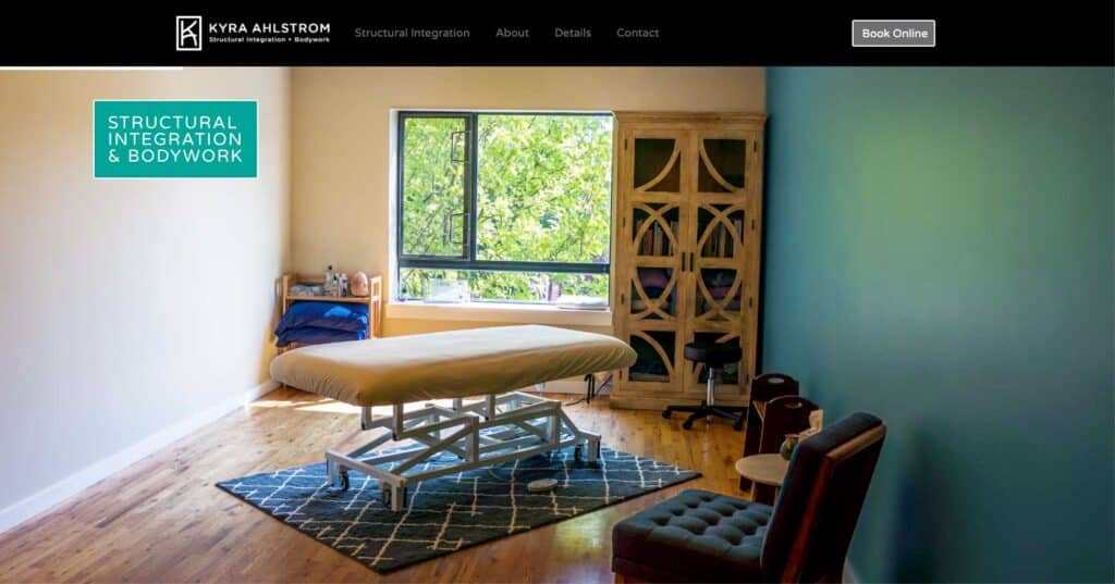 Homepage screenshot of the Kyra Alhstrom website built by Ink Stained Creative, featuring a photograph we took of her massage studio.